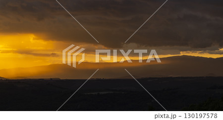 Golden sunset illuminating mountains in Provence, France Golden sunset illuminating mountains in Provence, France 130197578