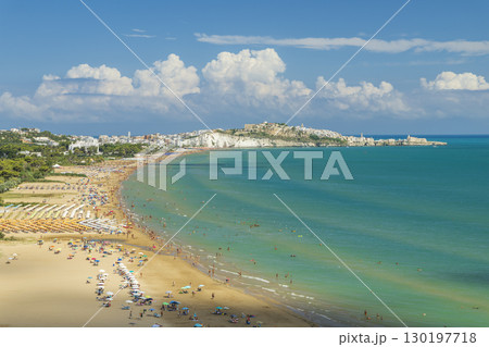 Tourists relaxing on the Pizzomunno Beach in Vieste, Italy 130197718