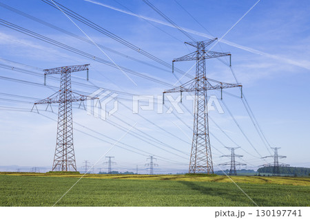 Electricity pylons transporting energy in Czechia countryside Electricity pylons transporting energy in Czechia countryside 130197741