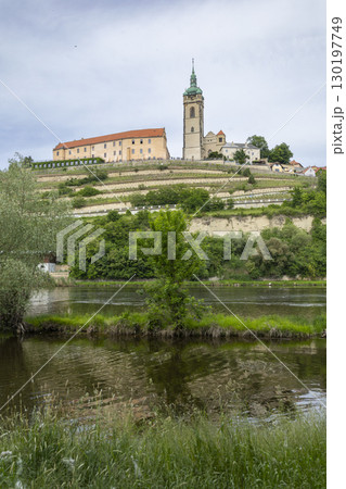Melnik Castle overlooking the confluence of the Elbe and Vltava rivers in Czechia Melnik Castle overlooking the confluence of the Elbe and Vltava rivers in Czechia 130197749
