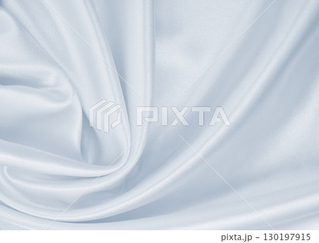 Smooth elegant grey silk or satin luxury cloth as wedding background. Luxurious Christmas background or New Year background design Smooth elegant grey silk or satin luxury cloth as wedding background. Luxurious Christmas background or New Year background design 130197915