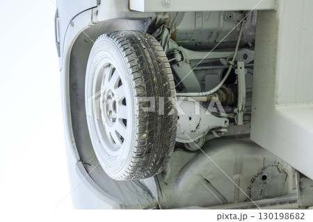 Homemade sculpture of three cars. Monument to the cyrillic lette 130198682