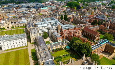Aerial view of Cambridge University colleges and buildings showing green lawns and courtyards Aerial view of Cambridge University colleges and buildings showing green lawns and courtyards 130198755