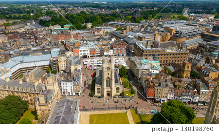Cambridge Market Square and Great St Mary's Church rising above the City of Cambridge, UK 130198760