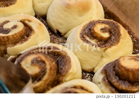 Close-up cinnabon buns freshly baked before applying cream 130201211