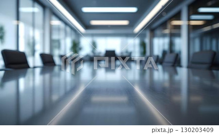 A modern office meeting room with a conference table and chairs, prepared for discussions and teamwork 130203409