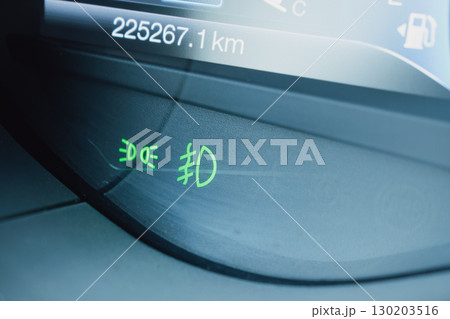 Green fog light indicators on a car dashboard Green fog light indicators on a car dashboard 130203516
