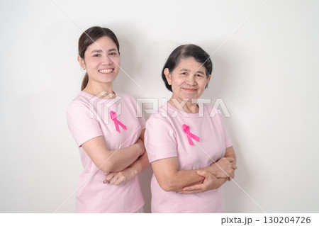 Couple woman with pink Ribbon for Pink October Breast Cancer Awareness month, May Women Health, November Birth Parents Adoption, women rights, Empowerment, March International Women day and Cancer day 130204726