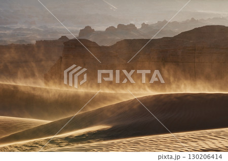 Majestic Gobi desert landscape with amazing wind and fierce sandstorm at sunset 130206414