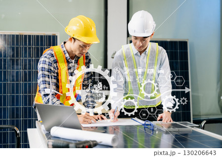 Alternative energy engineers discussing a project with a worker businesspeople a meeting in solar cell panel Alternative energy engineers discussing a project with a worker businesspeople a meeting in solar cell panel 130206643