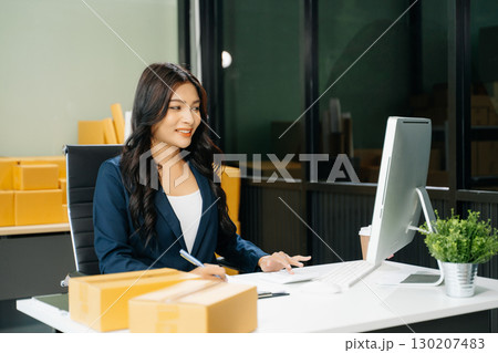 Startup small business SME, Entrepreneur owner woman using smartphone or tablet taking receive and checking 130207483