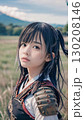 戦国時代の戦場で空を見上げる鎧を着た悲しげな顔の若い女性武士	 130208146