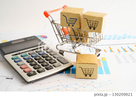 Online shopping, Shopping cart box on business graph, import export, finance commerce. Online shopping, Shopping cart box on business graph, import export, finance commerce. 130209021