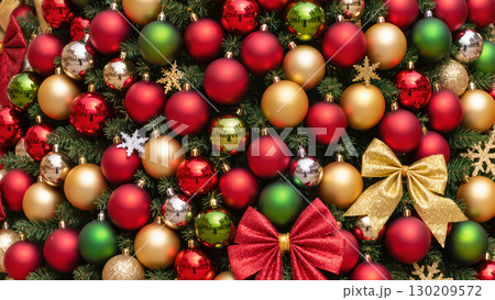 Christmas tree decorated with colorful red, gold, green ornaments, shiny bows and snowflakes. Classic festive holiday decoration close-up. 130209572