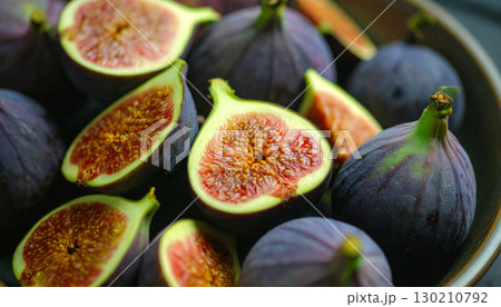Rustic style fresh figs sliced open, autumn fruit showing detailed interior texture 130210792