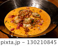 Spaghetti creamy tomato sauce with bacon scallop served on a plate. Soft Focus. 130210845