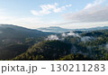 Morning mist in the forest and mountains 130211283