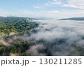 Morning mist in the forest and mountains 130211285