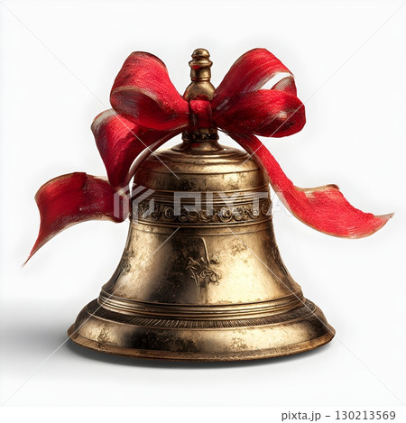Antique bronze handbell with ornate engravings and a bright red ribbon bow, isolated on white. 130213569