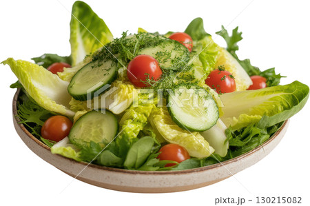 Fresh garden salad with crisp lettuce ripe tomatoes and sliced cucumbers in a rustic bowl 130215082