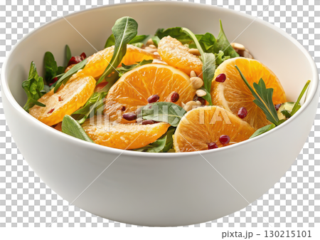 Vibrant and healthy fresh orange salad with arugula pomegranate seeds and nuts in a white bowl 130215101