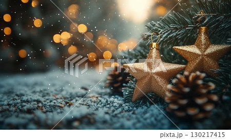 Pine branches with golden star ornaments on snowy surface, winter holiday atmosphere Pine branches with golden star ornaments on snowy surface, winter holiday atmosphere 130217415