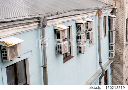 air conditioners are installed on the wall of the building. cooling in hot weather. air conditioners are installed on the wall of the building. cooling in hot weather. 130218219