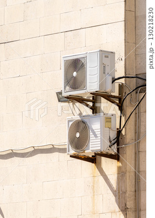 air conditioners are mounted on the wall. technologies for air cooling in hot weather. 130218230