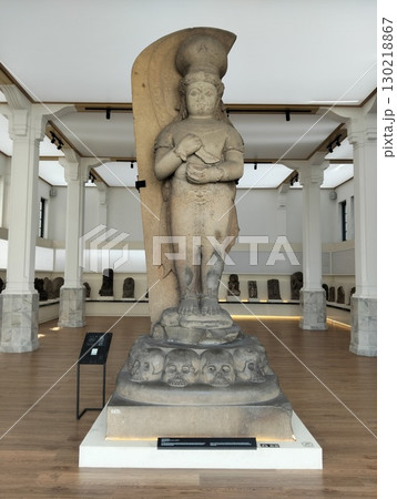 Stone Statue of a Deity at a Museum 130218867