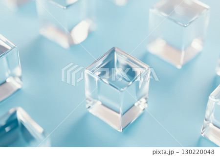 Transparent glass cubes floating against clear blue sky, concept background 130220048