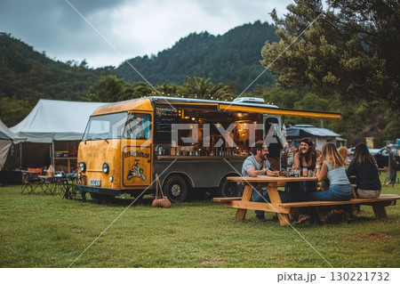 Food truck gathering scenic park outdoor event relaxed atmosphere group dining community vibe Food truck gathering scenic park outdoor event relaxed atmosphere group dining community vibe 130221732