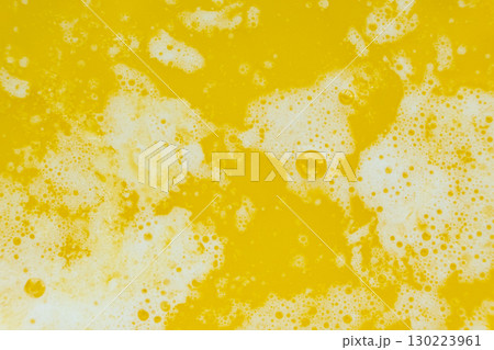 The process of making ghee from butter, macro texture. The process of making ghee from butter, macro texture. 130223961