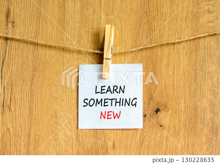 Learn something new symbol. Concept words Learn something new on beautiful white paper on clothespin. Beautiful wooden background. Business motivational learn something new concept. Copy space. Learn something new symbol. Concept words Learn something new on beautiful white paper on clothespin. Beautiful wooden background. Business motivational learn something new concept. Copy space. 130228635