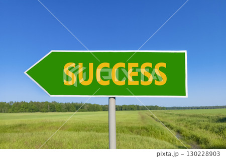 Success symbol. Concept word Success on beautiful green road sign. Beautiful blue sky green grass and forest peaceful nature background. Business success concept. Copy space. Success symbol. Concept word Success on beautiful green road sign. Beautiful blue sky green grass and forest peaceful nature background. Business success concept. Copy space. 130228903