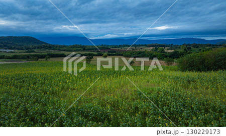 Aerial view of A beautiful view of a long, colorful mountain range Aerial view of A beautiful view of a long, colorful mountain range 130229173