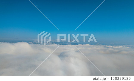 Aerial view of the mist cover the mountain at beautiful sunrise Aerial view of the mist cover the mountain at beautiful sunrise 130229189