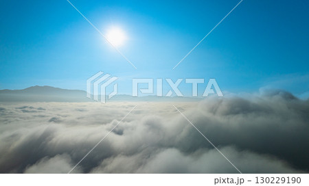 Aerial view of beautiful sunrise above the sea of mist Aerial view of beautiful sunrise above the sea of mist 130229190