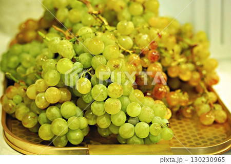 Fresh and vibrant grapes , showcasing a mix of colors. Perfect for healthy eating and fruit imagery. 130230965