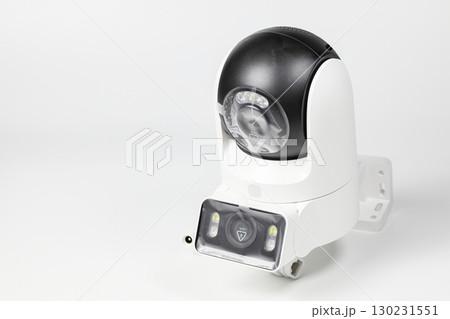 Modern white, wireless wi-fi IP cameras, CCTV Cameras for security with lens film protection isolated on a white background. 130231551
