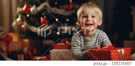 5 years old blonde boy child getting xmas gift present christmas tree, ai 130235007