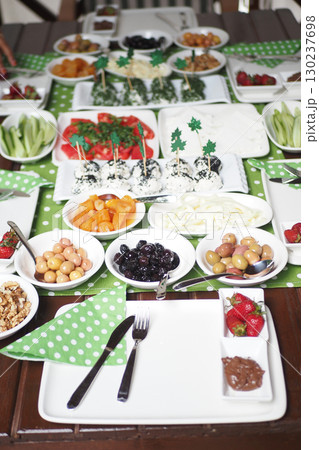 Colorful Display of olives and cheese on a Serving Table 130237698