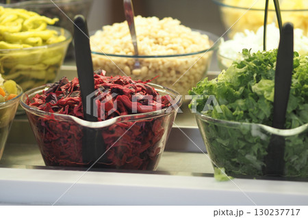 Colorful selection of fresh ingredients at a market stand 130237717