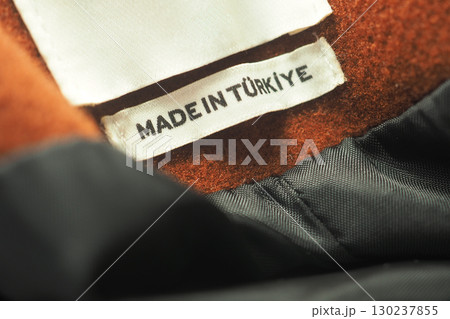 Label from clothing showing made in Turkey origin 130237855
