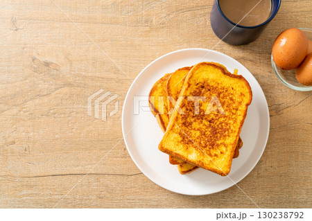 french toast on white plate 130238792
