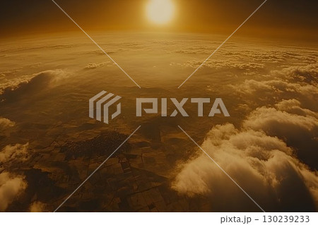 Golden Sunset Over Earth: Aerial View of Cloud-Covered Landscape 130239233