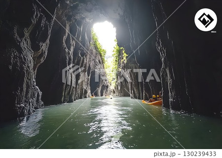 Kayakers Navigate a Dark River Cave, Sunlight at the End 130239433