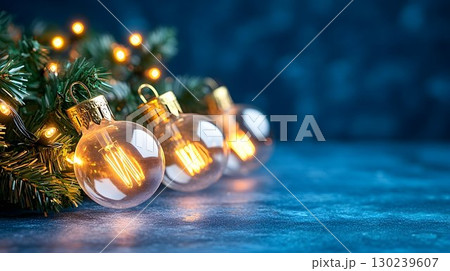 Festive Edison Bulb Ornaments on Christmas Tree Branch Festive Edison Bulb Ornaments on Christmas Tree Branch 130239607