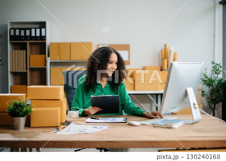 eelance woman working at home office, BOX,tablet and laptop online, marketing, packaging, delivery,  e-commerce concept 130240168