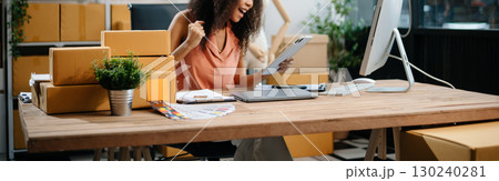 eelance woman working at home office, BOX,tablet and laptop online, marketing, packaging, delivery,  e-commerce concept 130240281