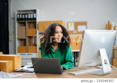 eelance woman working at home office, BOX,tablet and laptop online, marketing, packaging, delivery, e-commerce concept eelance woman working at home office, BOX,tablet and laptop online, marketing, packaging, delivery, e-commerce concept 130240307
